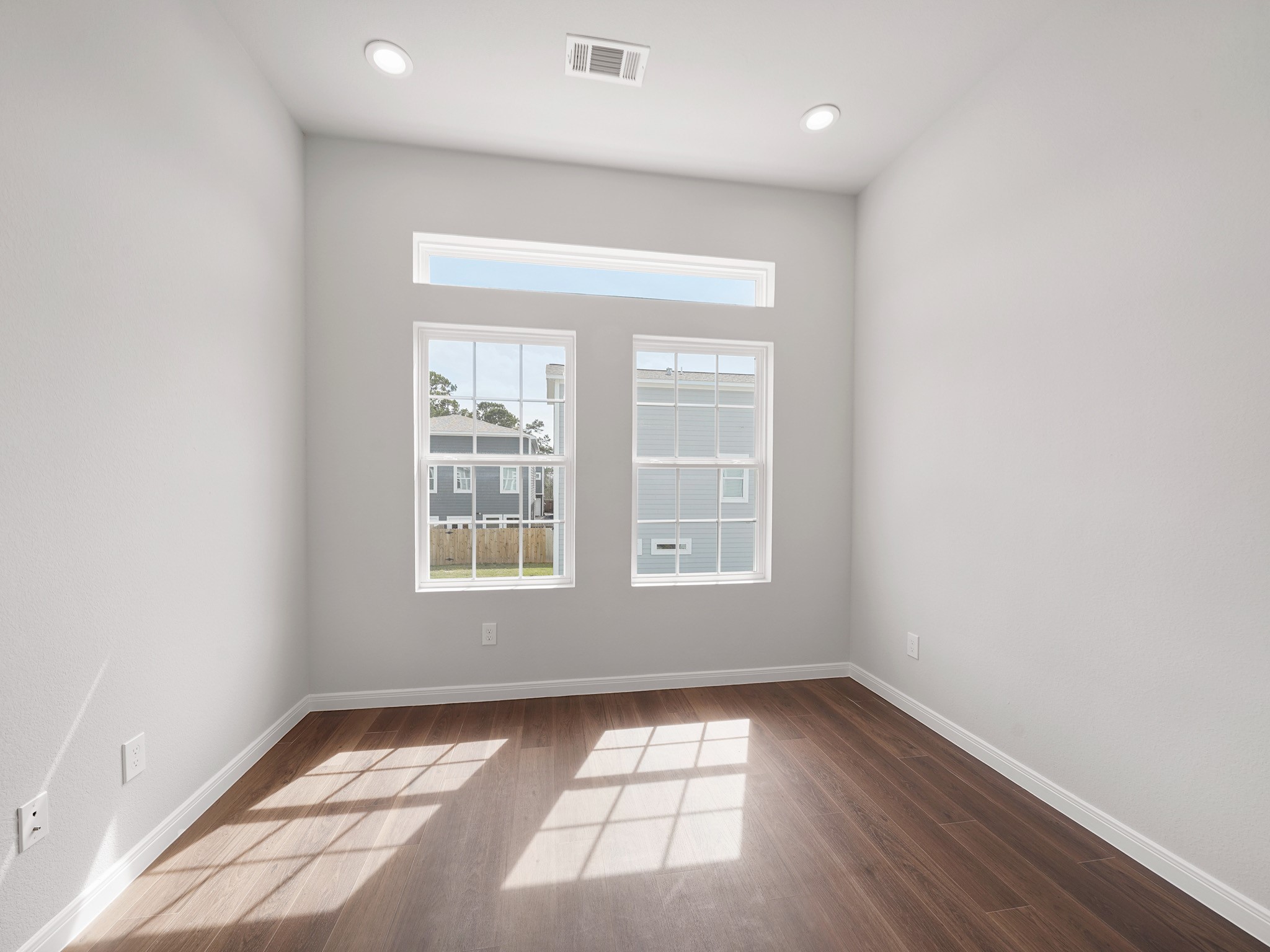 18846 Elegance Ave Spring Spring, TX 77379 - Photo 8 of 16 a view of an empty room and window