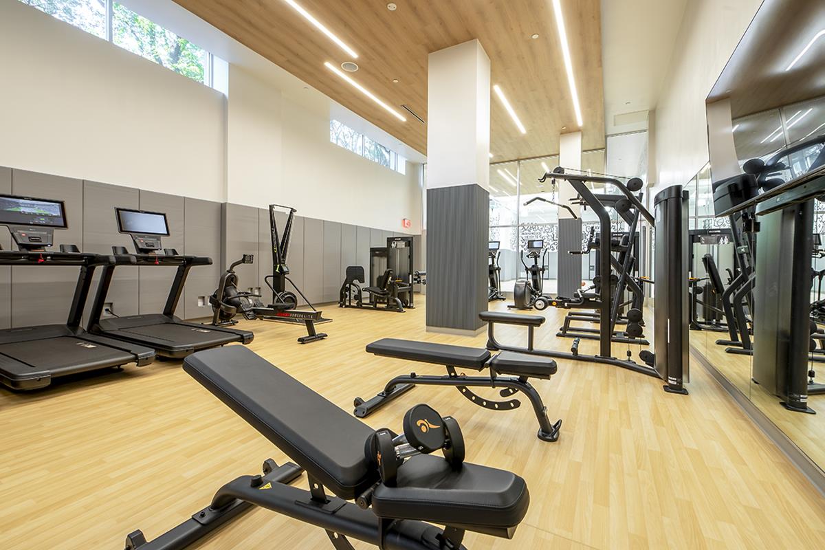 1440 Amsterdam Avenue, Unit 1212 Manhattan, NY 10027 - Photo 7 of 21 a view of a room with gym equipment