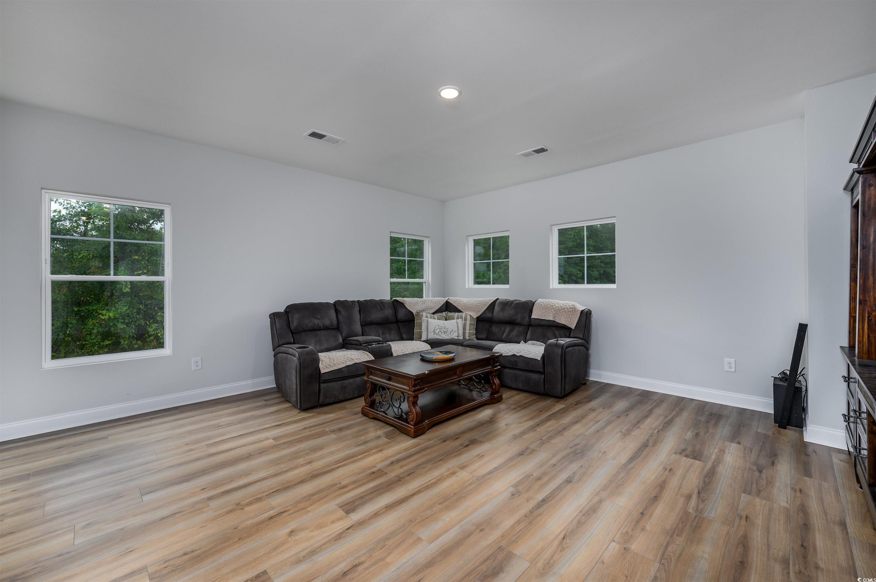2550 Dogwood Road Longs, SC 29568 - Photo 26 of 35 Living area with light wood-type flooring and recessed lighting