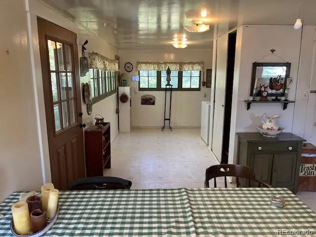 a white refrigerator freezer sitting inside of a kitchen