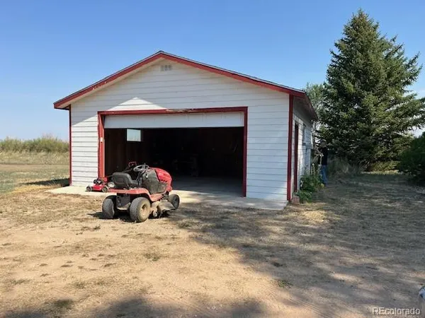 a view of car parked in front of house