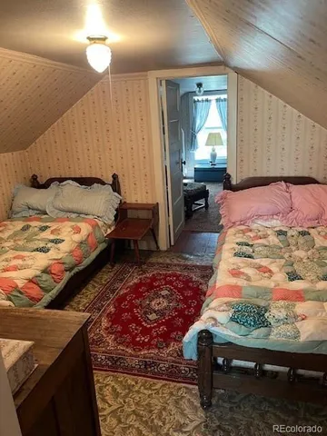 a living room with a couch and a table