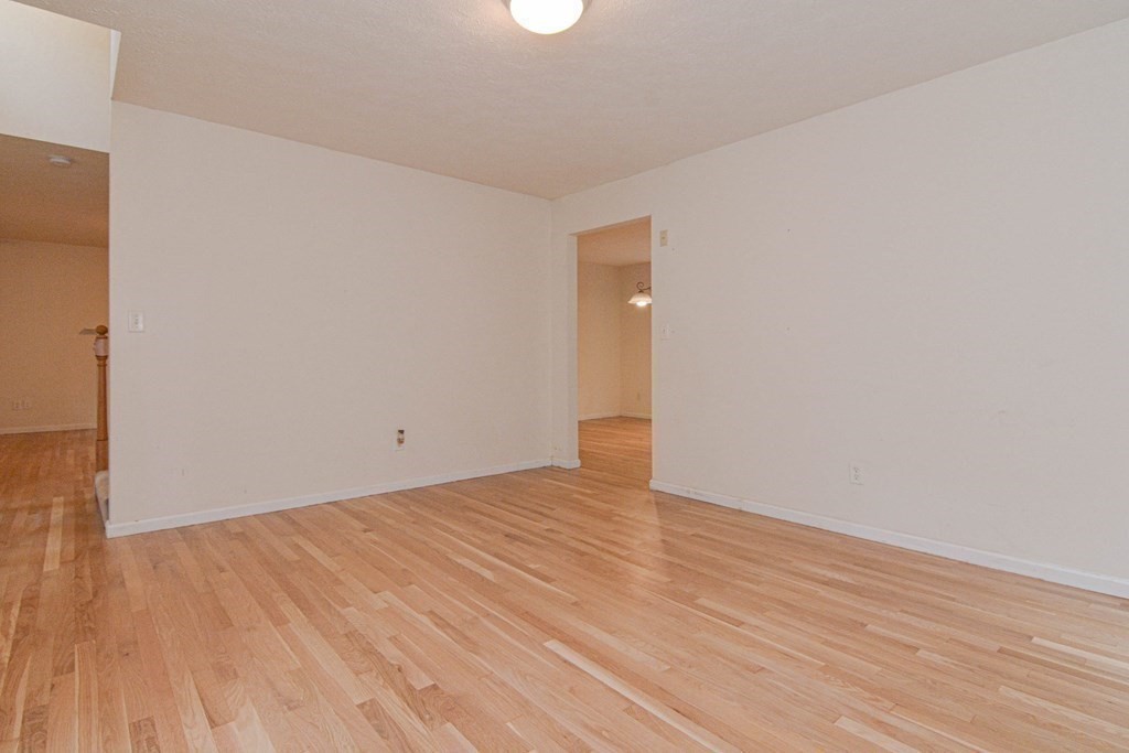 21 Shore Drive Upton, MA 01568 - Photo 12 of 29 a view of an empty room and wooden floor