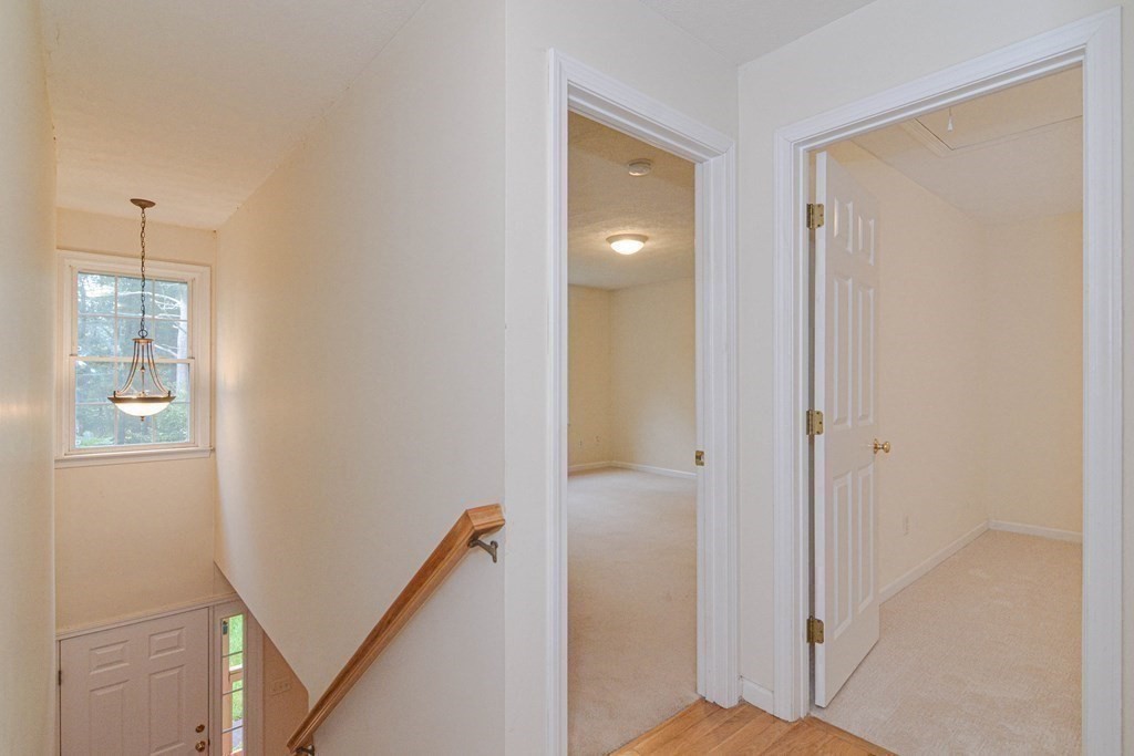 21 Shore Drive Upton, MA 01568 - Photo 15 of 29 a view of a hallway with windows and entryway