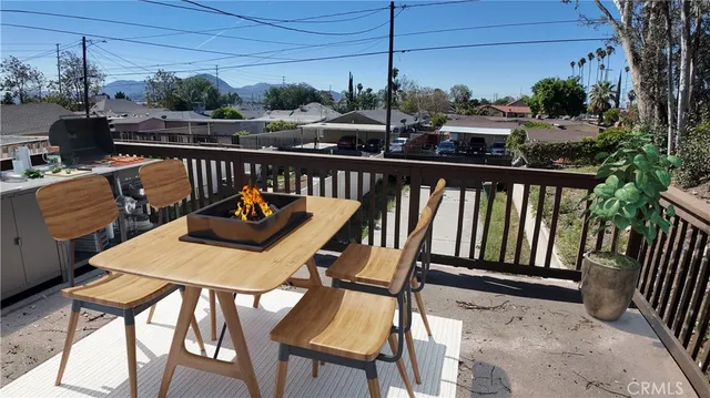 a view of a balcony and chairs