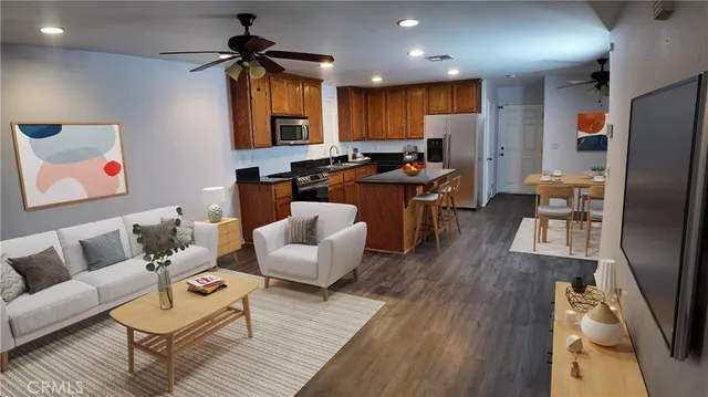 a living room with fireplace furniture and a flat screen tv