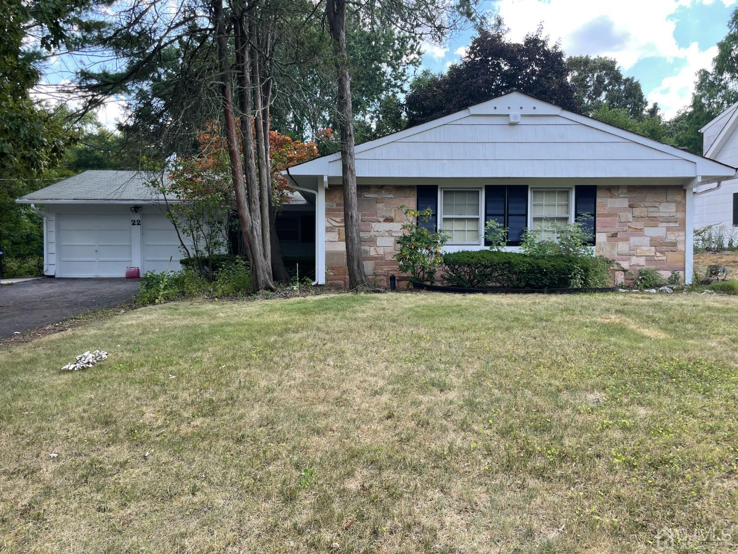 22 Abbott Road Somerset, NJ 08873 - Photo 1 of 15 a front view of a house with yard and green space
