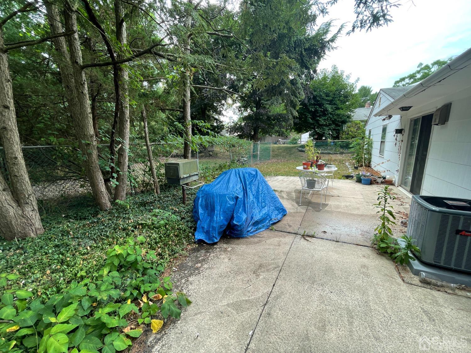 22 Abbott Road Somerset, NJ 08873 - Photo 15 of 15 a view of backyard with outdoor seating and green space