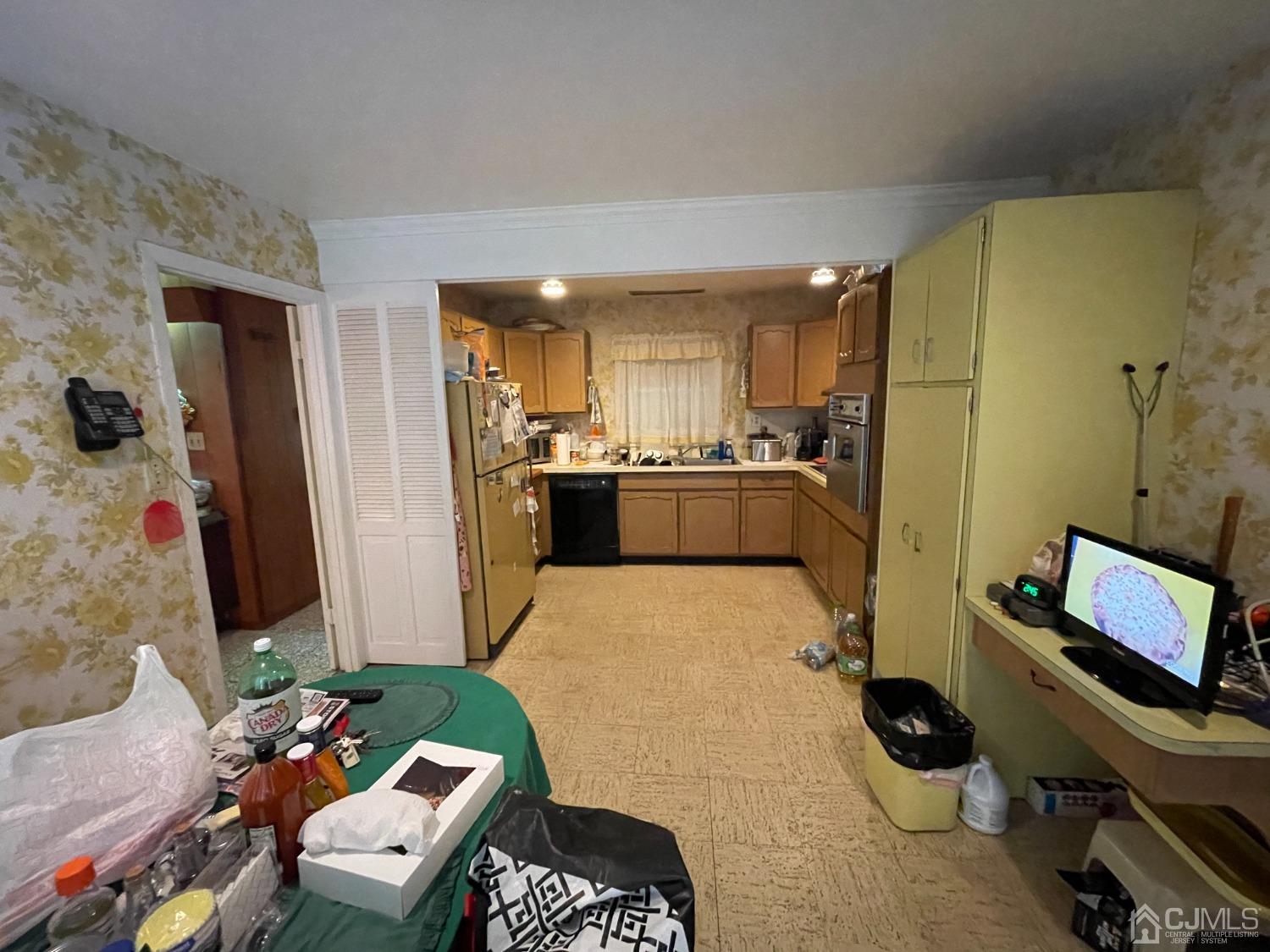 22 Abbott Road Somerset, NJ 08873 - Photo 6 of 15 a living room with furniture and a flat screen tv