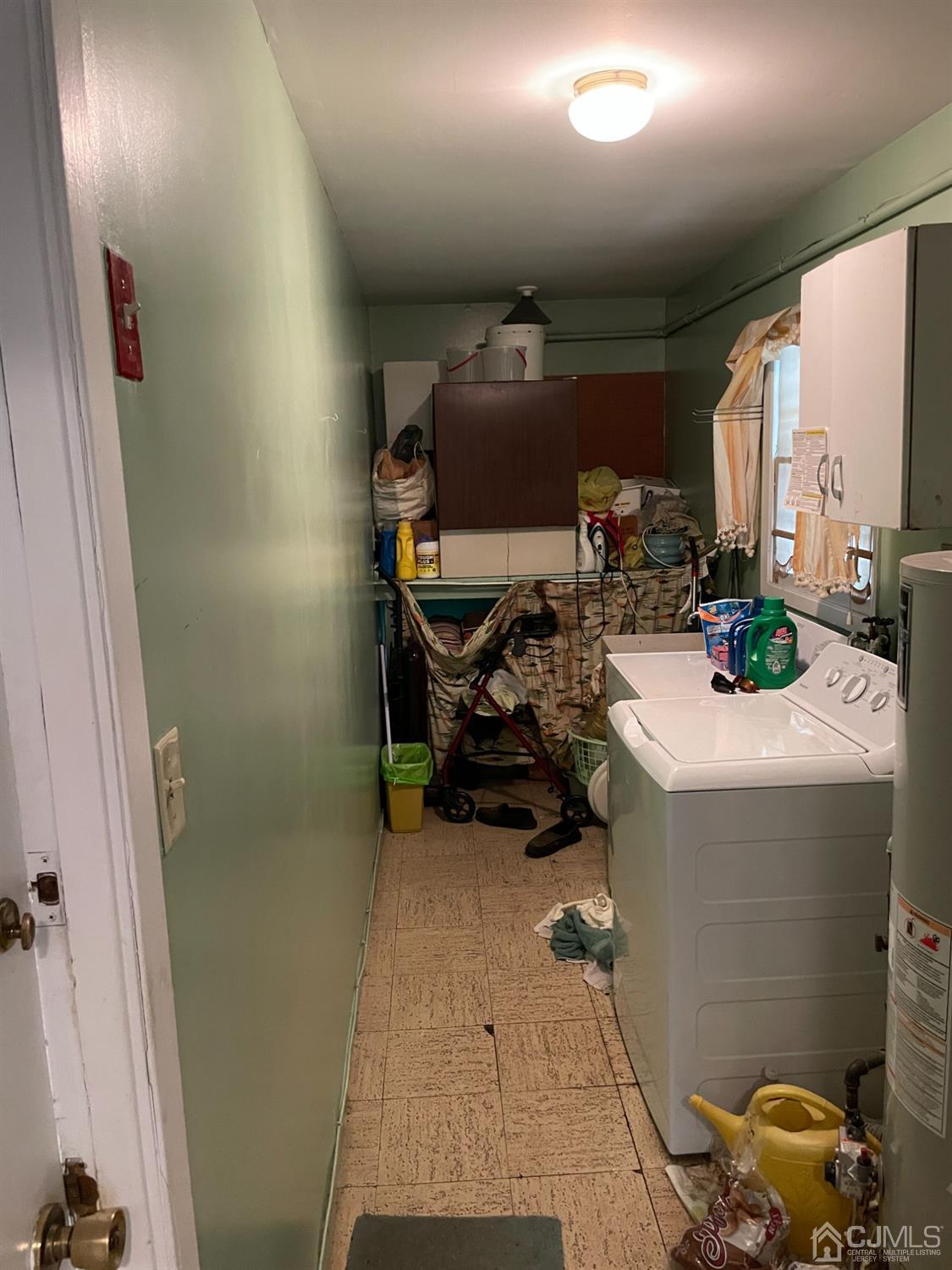 22 Abbott Road Somerset, NJ 08873 - Photo 8 of 15 a view of storage and utility room