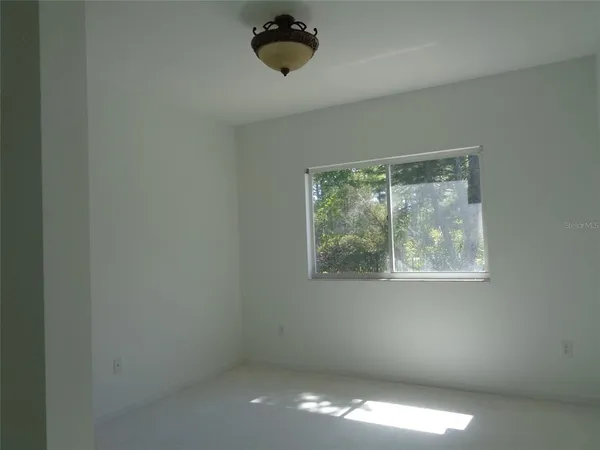 a view of a house with a swimming pool