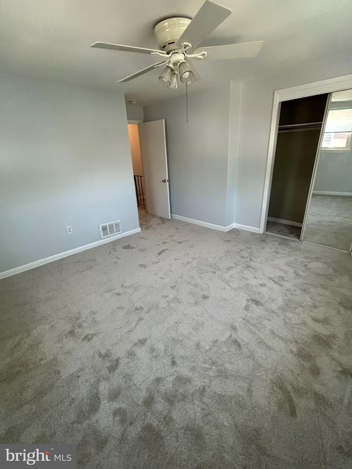 15 East Avon Road Brookhaven, PA 19015 - Photo 8 of 9 an empty room with fan and entrance
