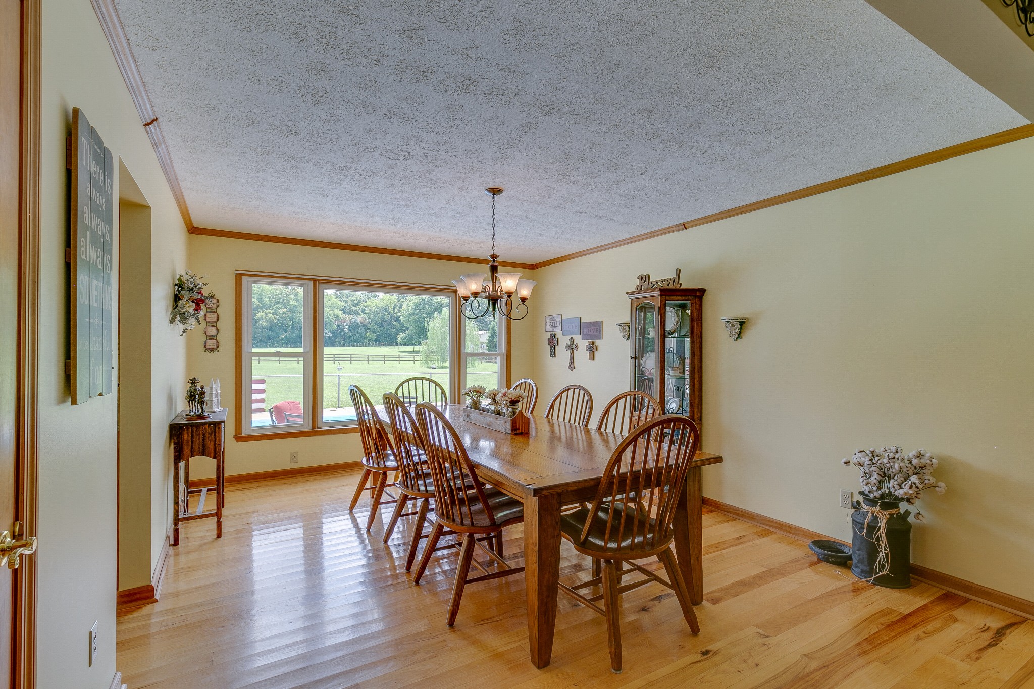 1872 Clara Mathis Road Spring Hill, TN 37174 - Photo 13 of 40 a view of a dining room with furniture window and wooden floor