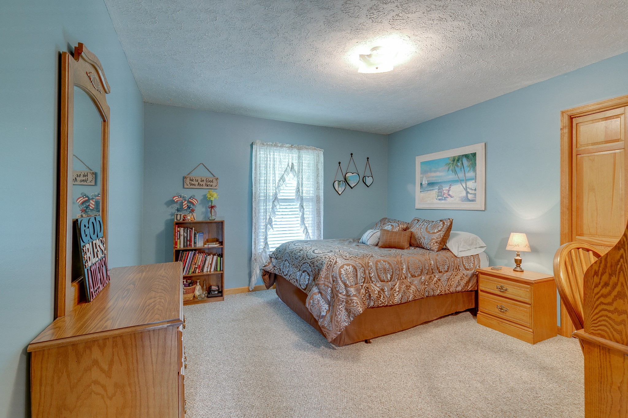 1872 Clara Mathis Road Spring Hill, TN 37174 - Photo 18 of 40 a bedroom with a bed and a window