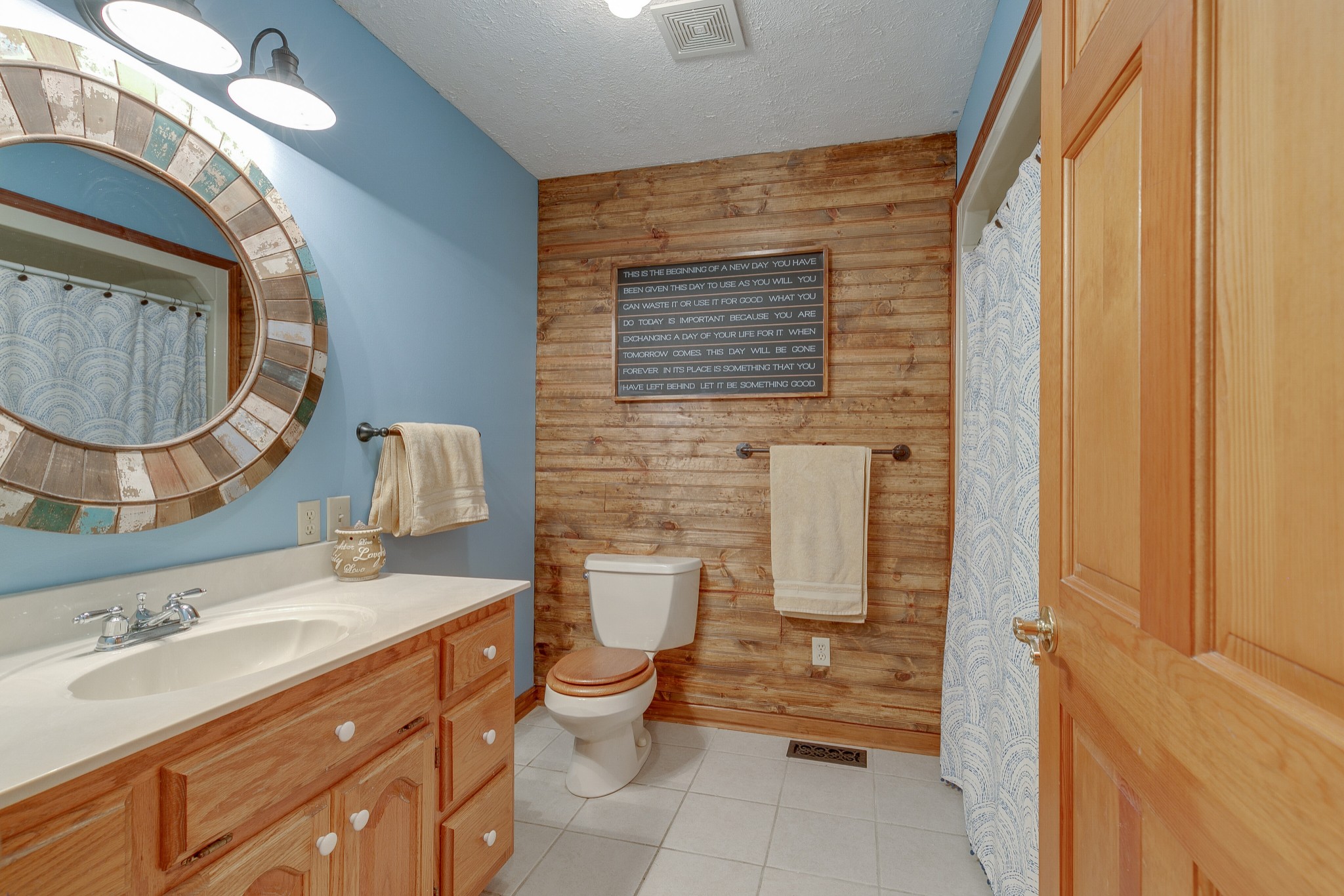 1872 Clara Mathis Road Spring Hill, TN 37174 - Photo 20 of 40 a bathroom with a double vanity sink mirror and toilet