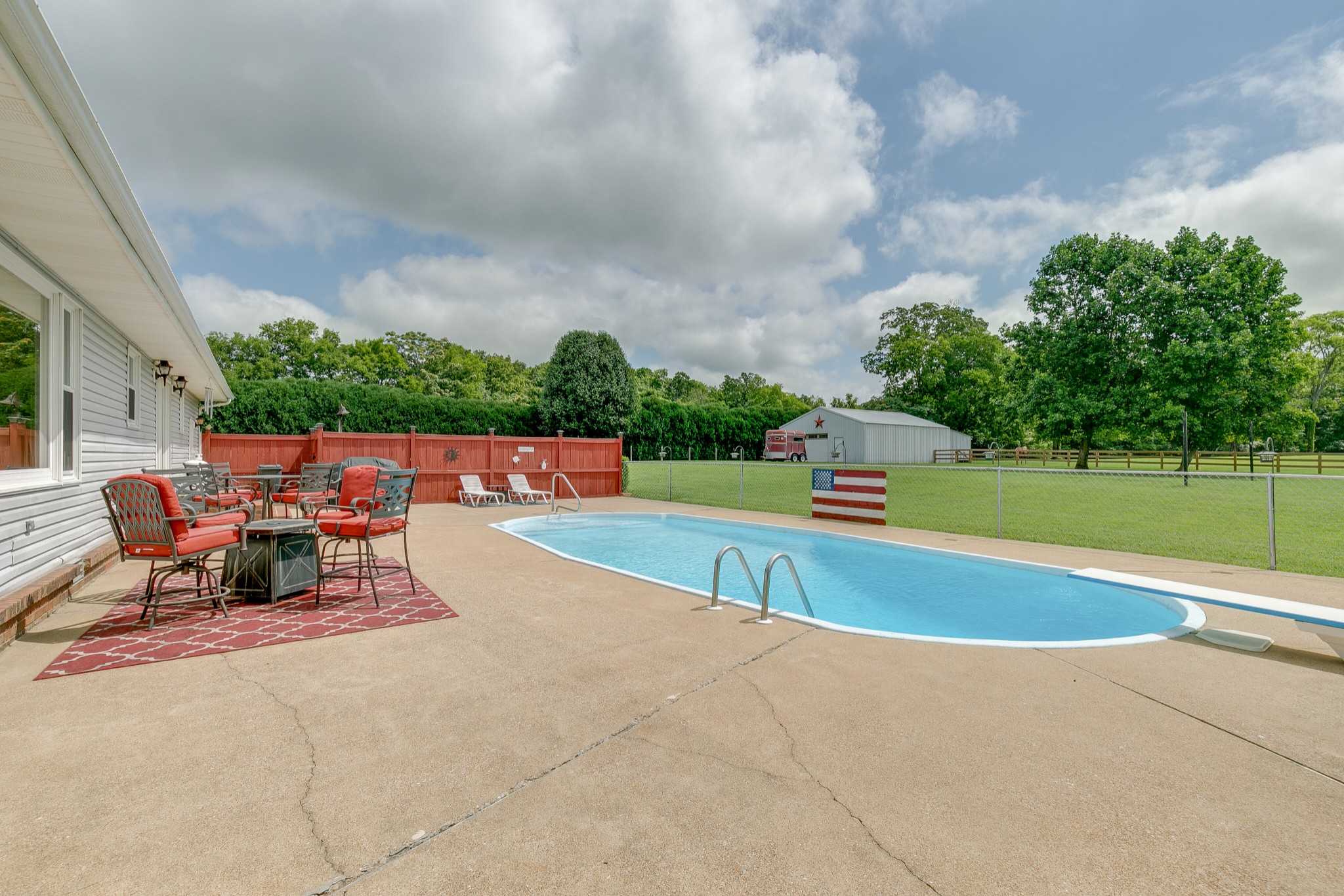 1872 Clara Mathis Road Spring Hill, TN 37174 - Photo 22 of 40 a view of a swimming pool with a lounge chair
