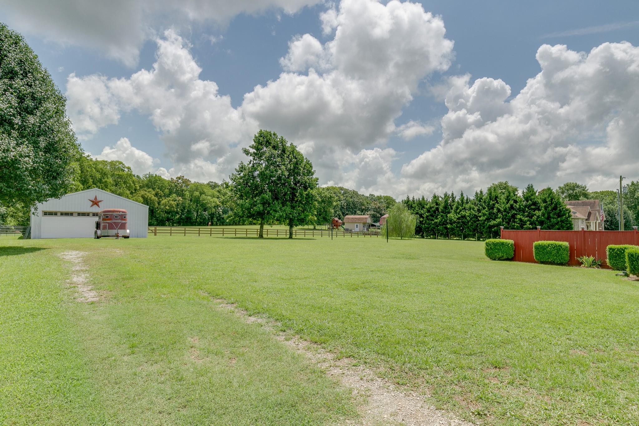 1872 Clara Mathis Road Spring Hill, TN 37174 - Photo 28 of 40 a view of a house with pool and a yard
