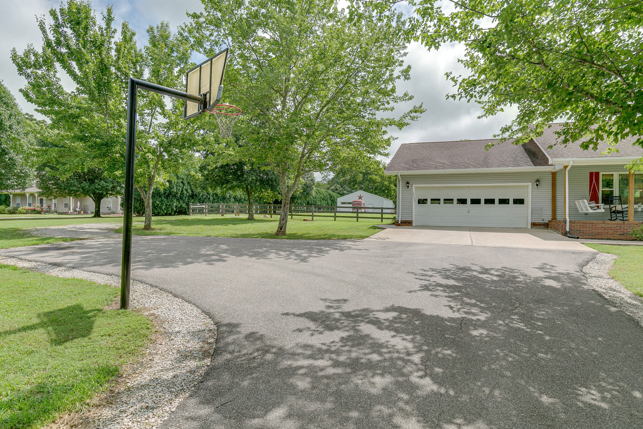 1872 Clara Mathis Road Spring Hill, TN 37174 - Photo 37 of 40 a view of a house with a yard and tree s