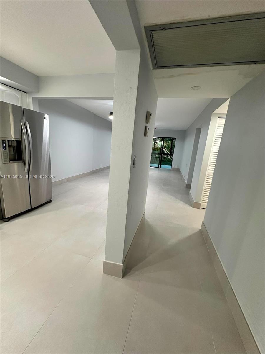 9440 Southwest 8th Street, Unit 402 Boca Raton, FL 33428 - Photo 11 of 45 a view of hallway with stairs