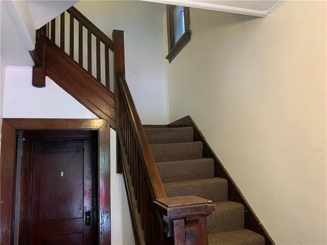 a view of entryway with wooden floor