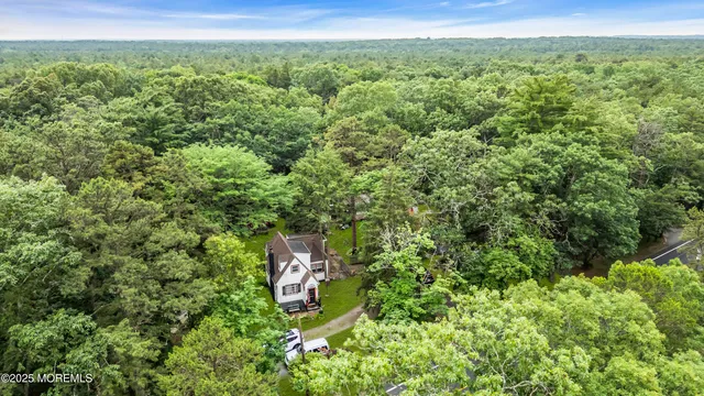 a aerial view of a house with swimming pool