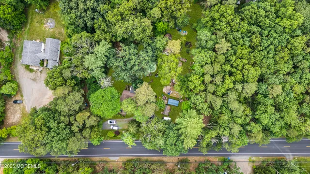 a view of a garden from a balcony