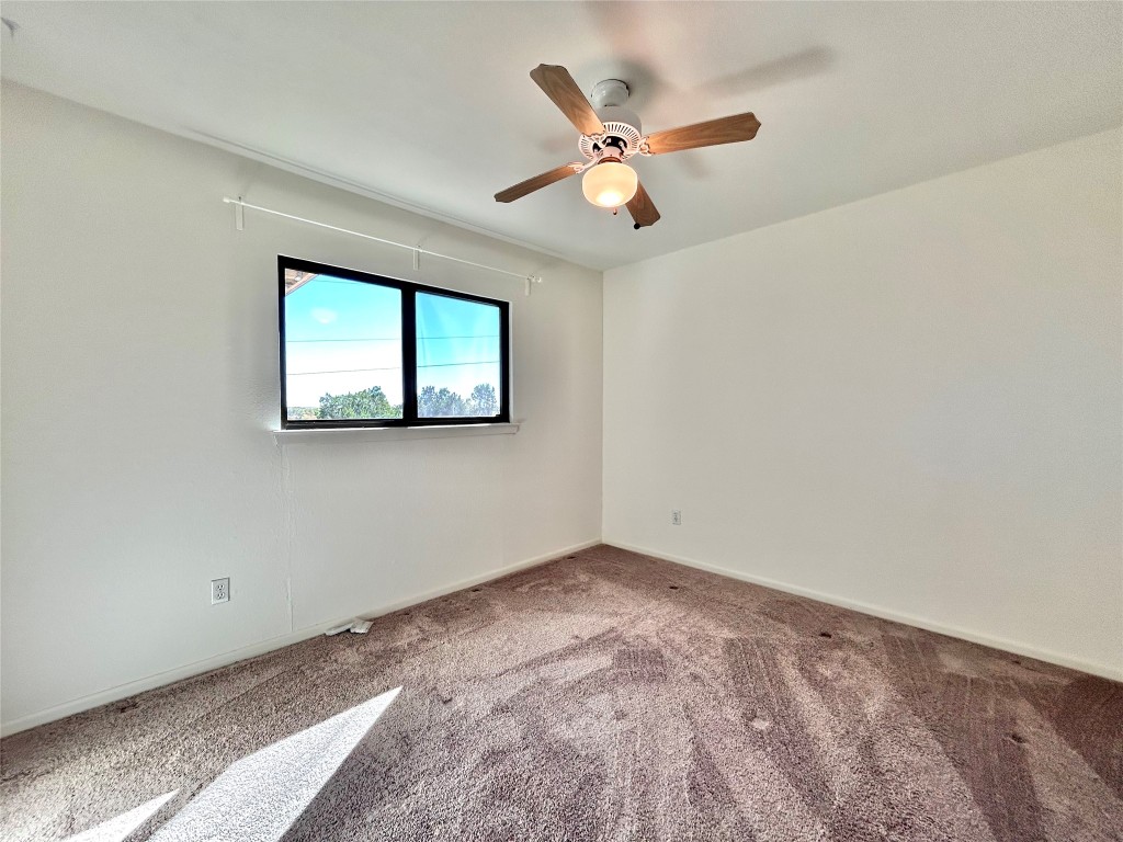 11205 Terrace Bluff Drive Austin, TX 78754 - Photo 22 of 37 an empty room with a window