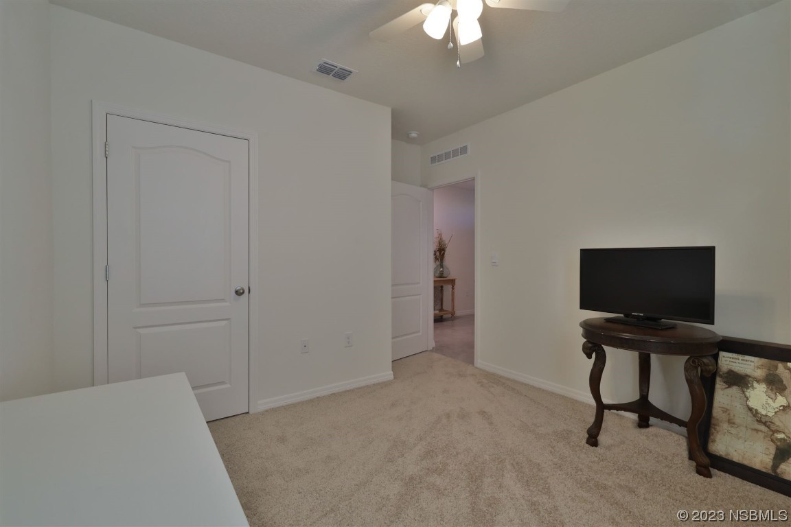 421 Anne Street DeLand, FL 32724 - Photo 23 of 44 a view of a livingroom with a flat screen tv