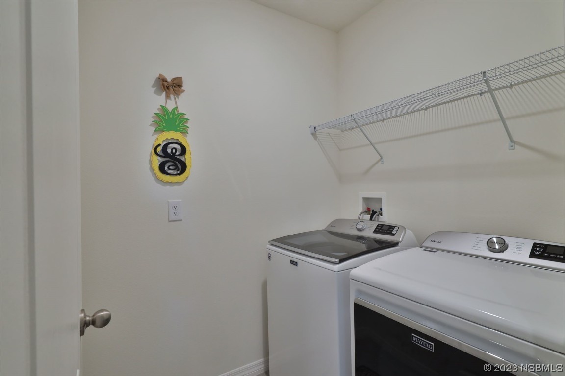 421 Anne Street DeLand, FL 32724 - Photo 24 of 44 a utility room with dryer and washer