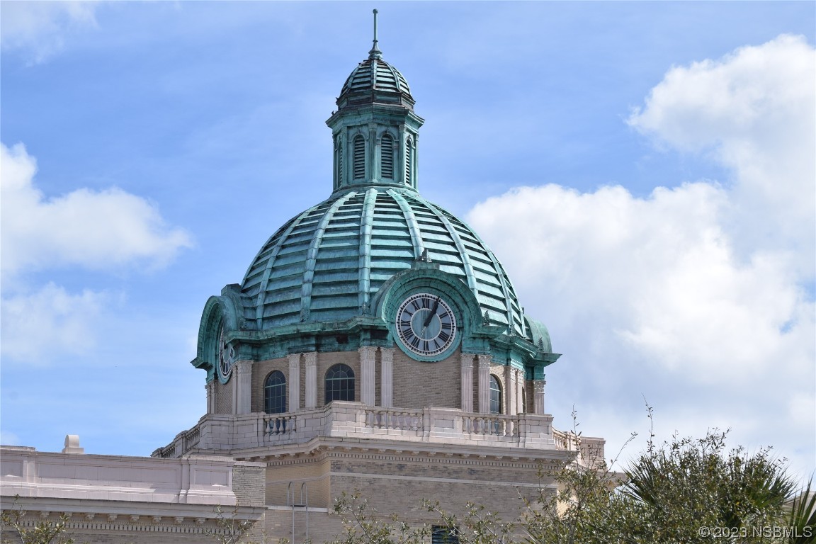 421 Anne Street DeLand, FL 32724 - Photo 41 of 44 a large building with a clock on the top