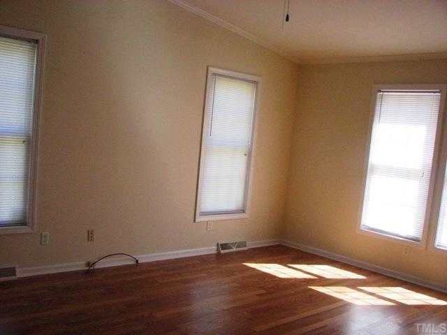817 Red Mountain Road Rougemont, NC 27572 - Photo 7 of 12 Master bedroom with laminate floors