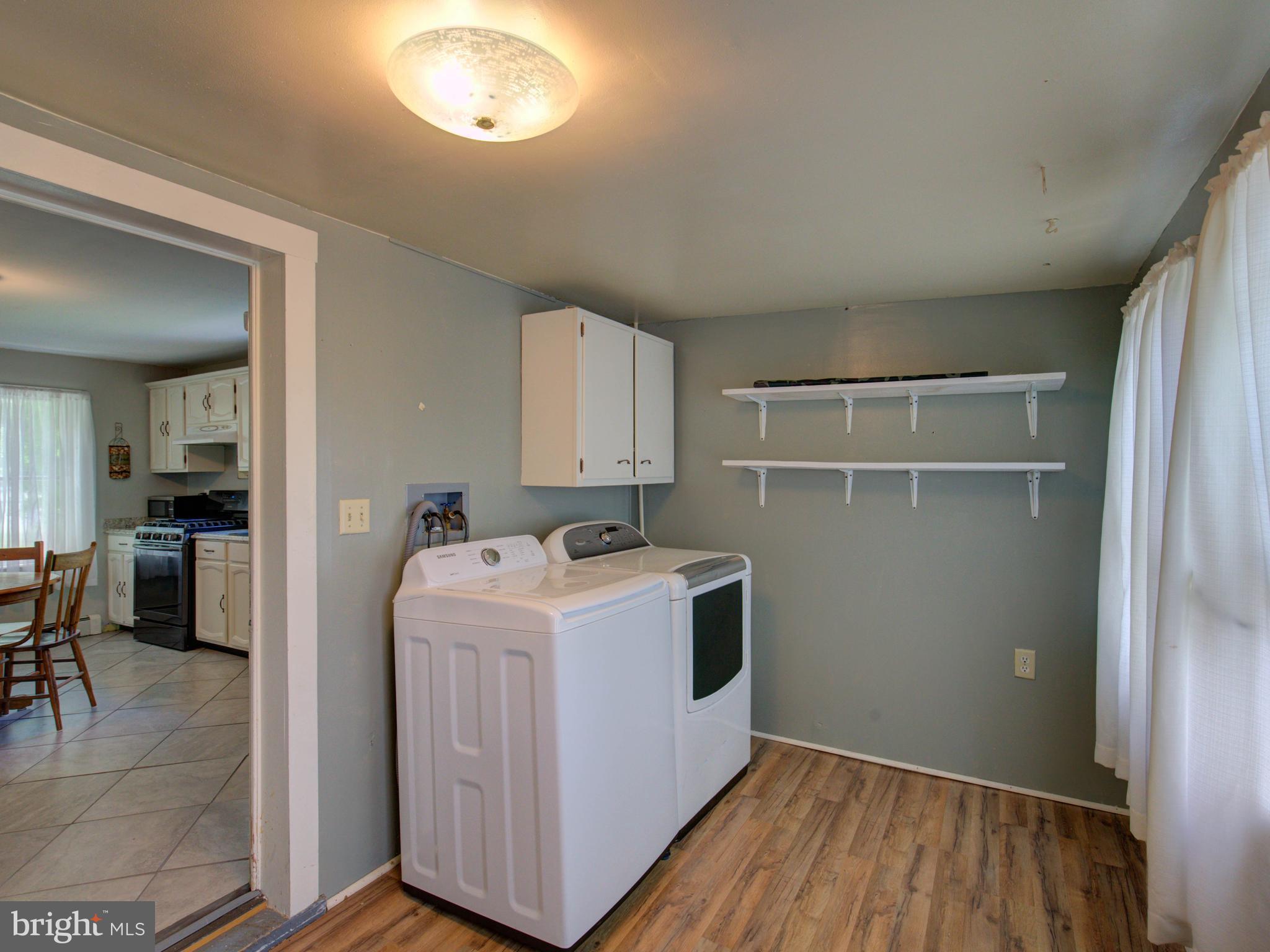 2902 Timber Ridge Road Berkeley Springs, WV 25411 - Photo 14 of 30 a utility room with washer and dryer
