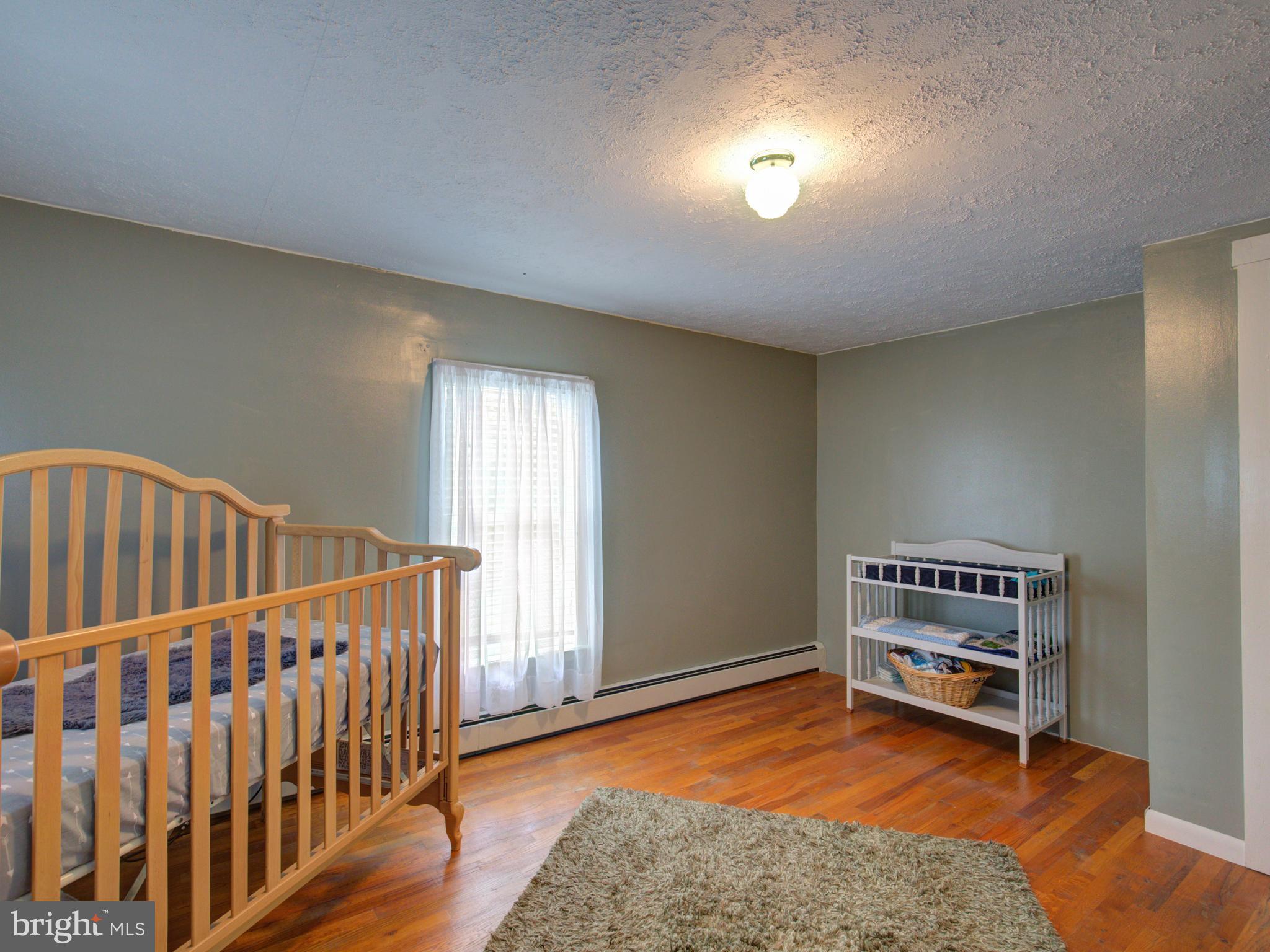 2902 Timber Ridge Road Berkeley Springs, WV 25411 - Photo 22 of 30 a view of livingroom with furniture and window