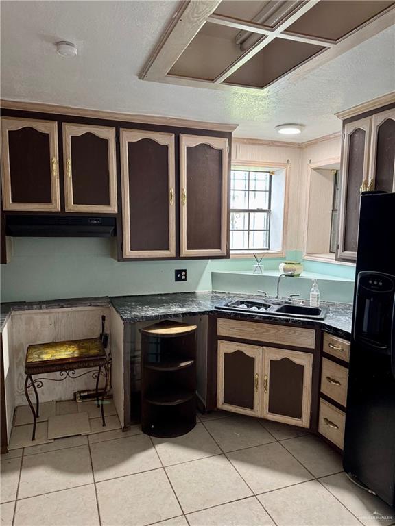 3813 North Taylor Road Mission, TX 78573 - Photo 11 of 29 a kitchen with stainless steel appliances granite countertop a stove and a microwave