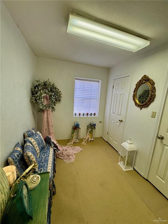 3813 North Taylor Road Mission, TX 78573 - Photo 15 of 29 a room with gym equipment and a table