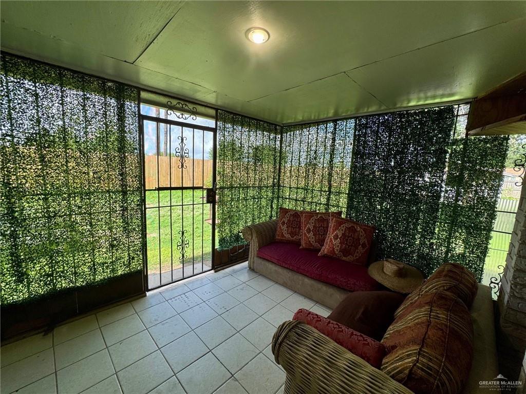 3813 North Taylor Road Mission, TX 78573 - Photo 20 of 29 a outdoor living space with furniture and a potted plant