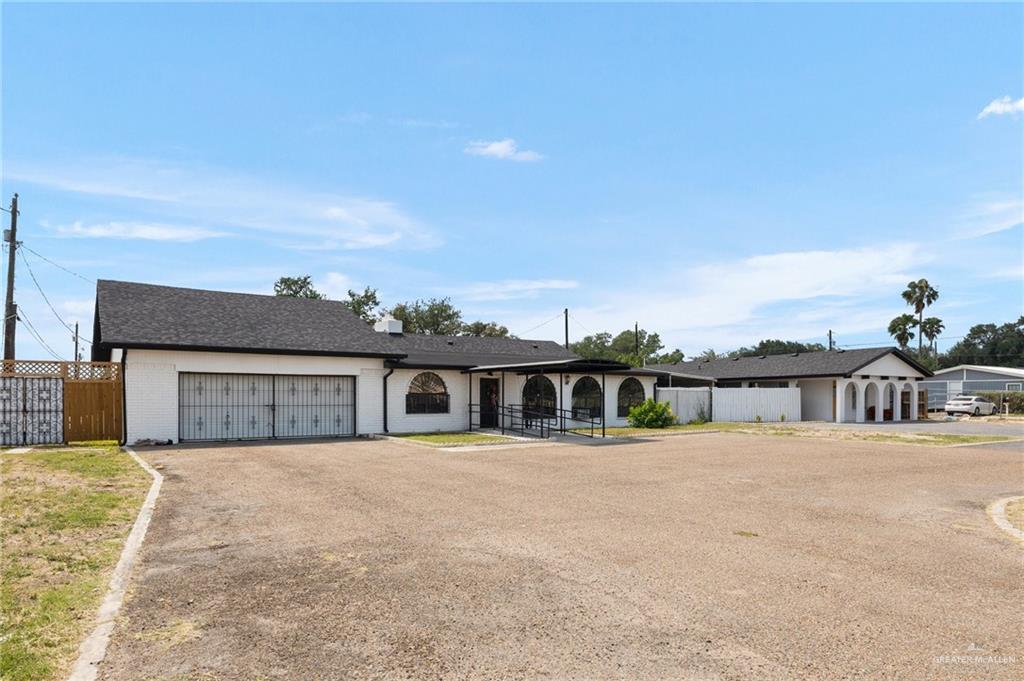 3813 North Taylor Road Mission, TX 78573 - Photo 2 of 29 a view of a house with a patio