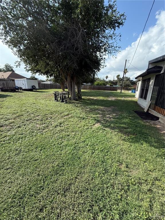 3813 North Taylor Road Mission, TX 78573 - Photo 22 of 29 a view of a house with a yard