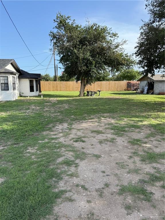 3813 North Taylor Road Mission, TX 78573 - Photo 23 of 29 a front view of a house with a yard