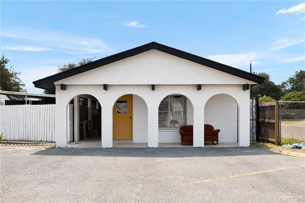 3813 North Taylor Road Mission, TX 78573 - Photo 4 of 29 a view of a house with a yard