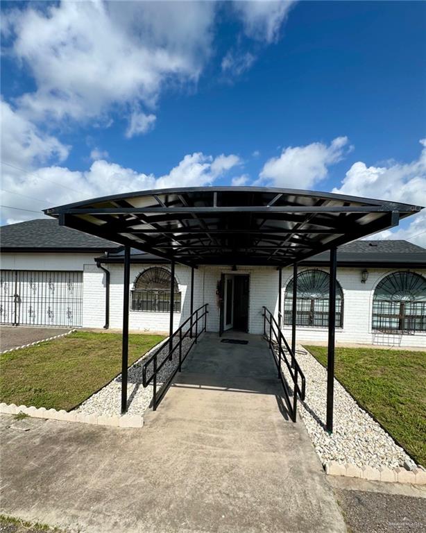 3813 North Taylor Road Mission, TX 78573 - Photo 5 of 29 a view of a backyard of a house