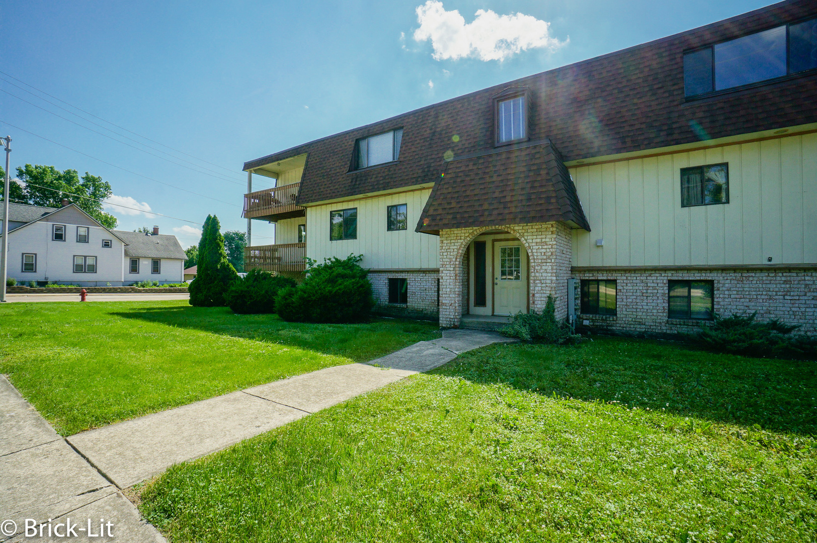 19444 Wolf Road, Unit 3 Mokena, IL 60448 - Photo 2 of 18 a view of a house with a back yard