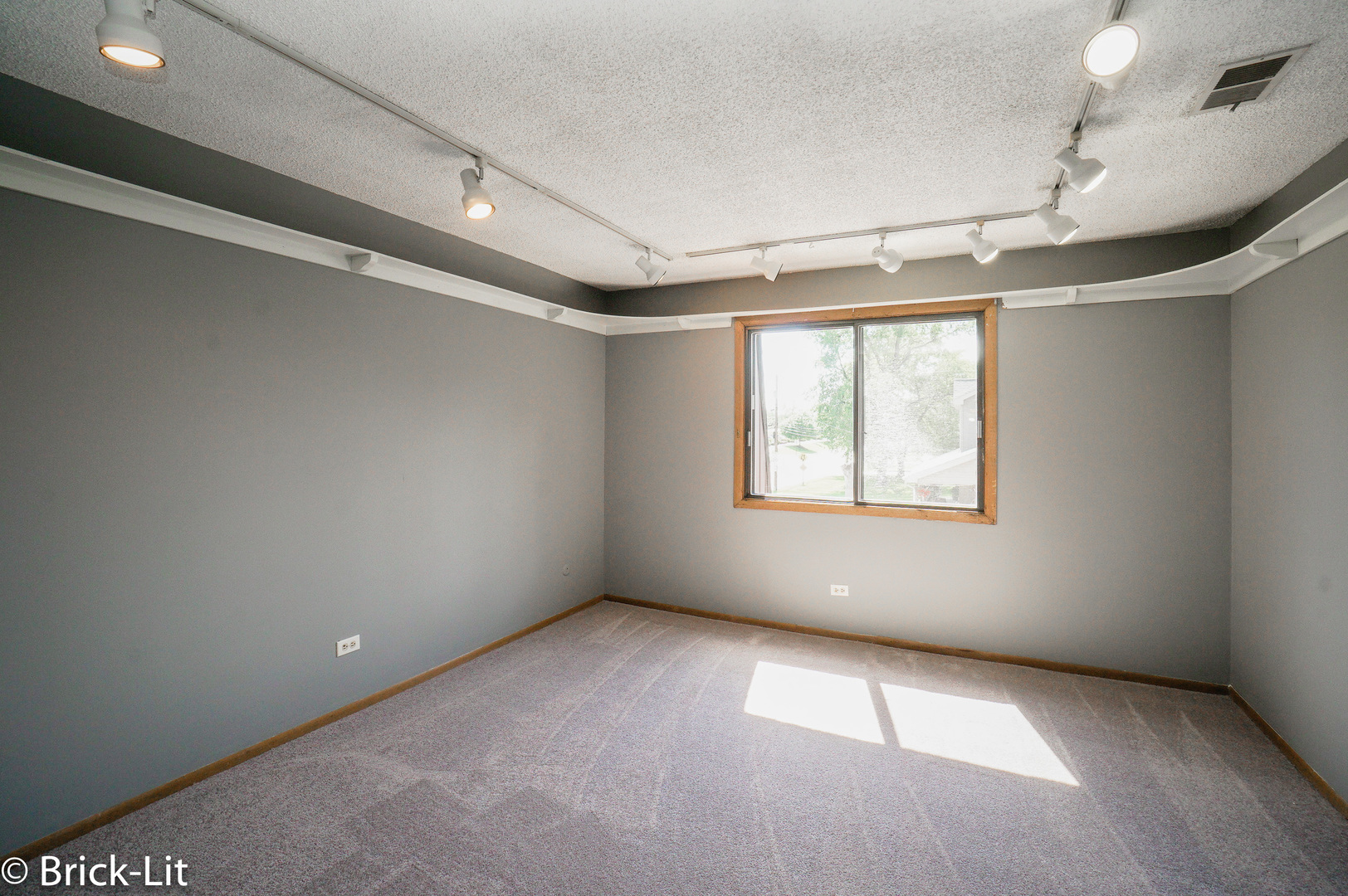 19444 Wolf Road, Unit 3 Mokena, IL 60448 - Photo 13 of 18 a view of an empty room with a window