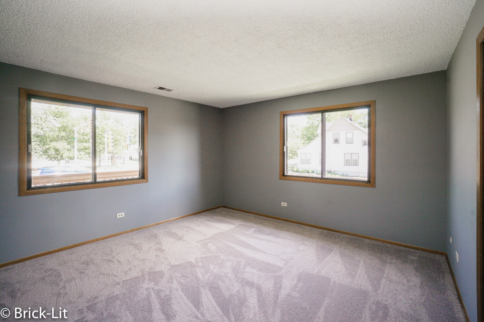 19444 Wolf Road, Unit 3 Mokena, IL 60448 - Photo 16 of 18 a view of an empty room with a window