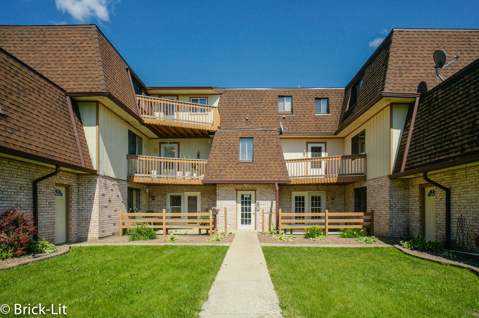 19444 Wolf Road, Unit 3 Mokena, IL 60448 - Photo 3 of 18 a front view of a house with a yard