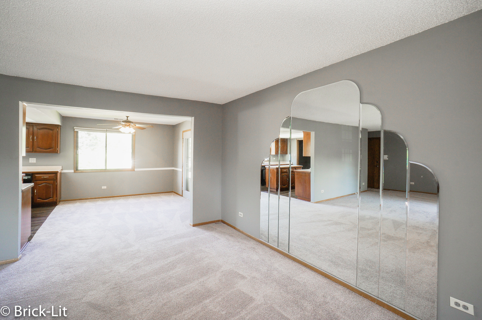 19444 Wolf Road, Unit 3 Mokena, IL 60448 - Photo 8 of 18 a view of a big room with windows and cabinet