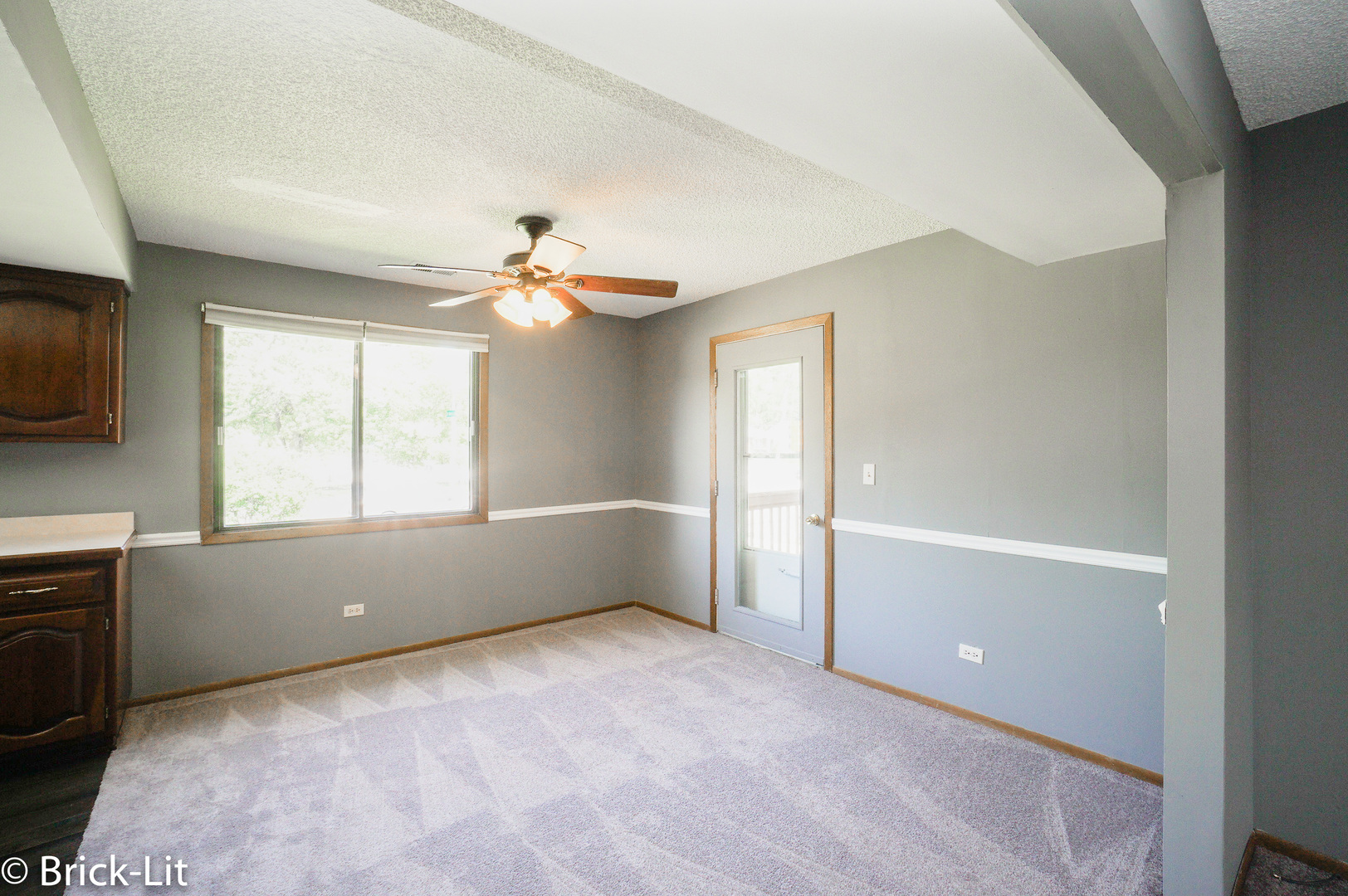 19444 Wolf Road, Unit 3 Mokena, IL 60448 - Photo 9 of 18 a view of an empty room with a window