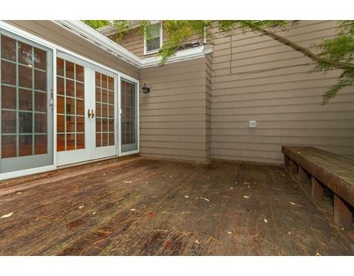 28 Constitution Road Lexington, MA 02421 - Photo 18 of 25 a view of a backyard with seating space