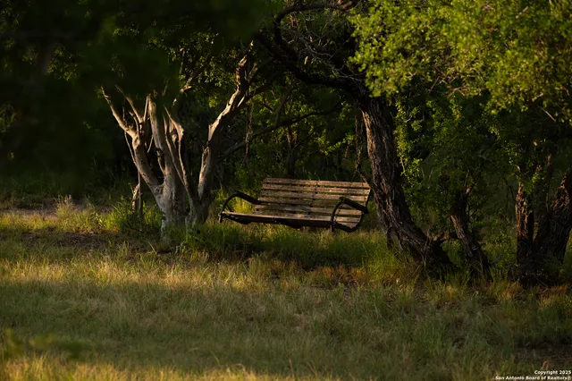 a view of swimming pool from a lake view