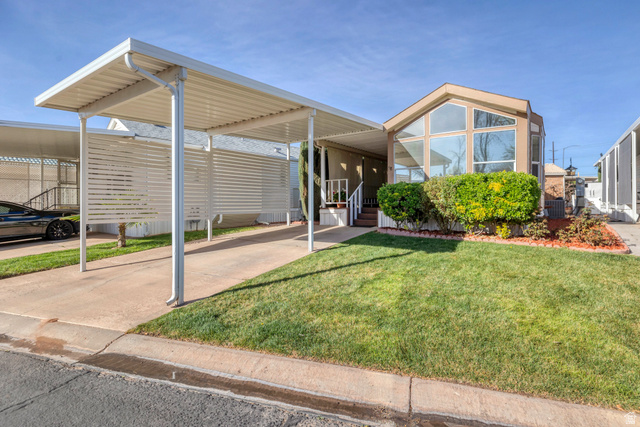 Front of home, covered carport